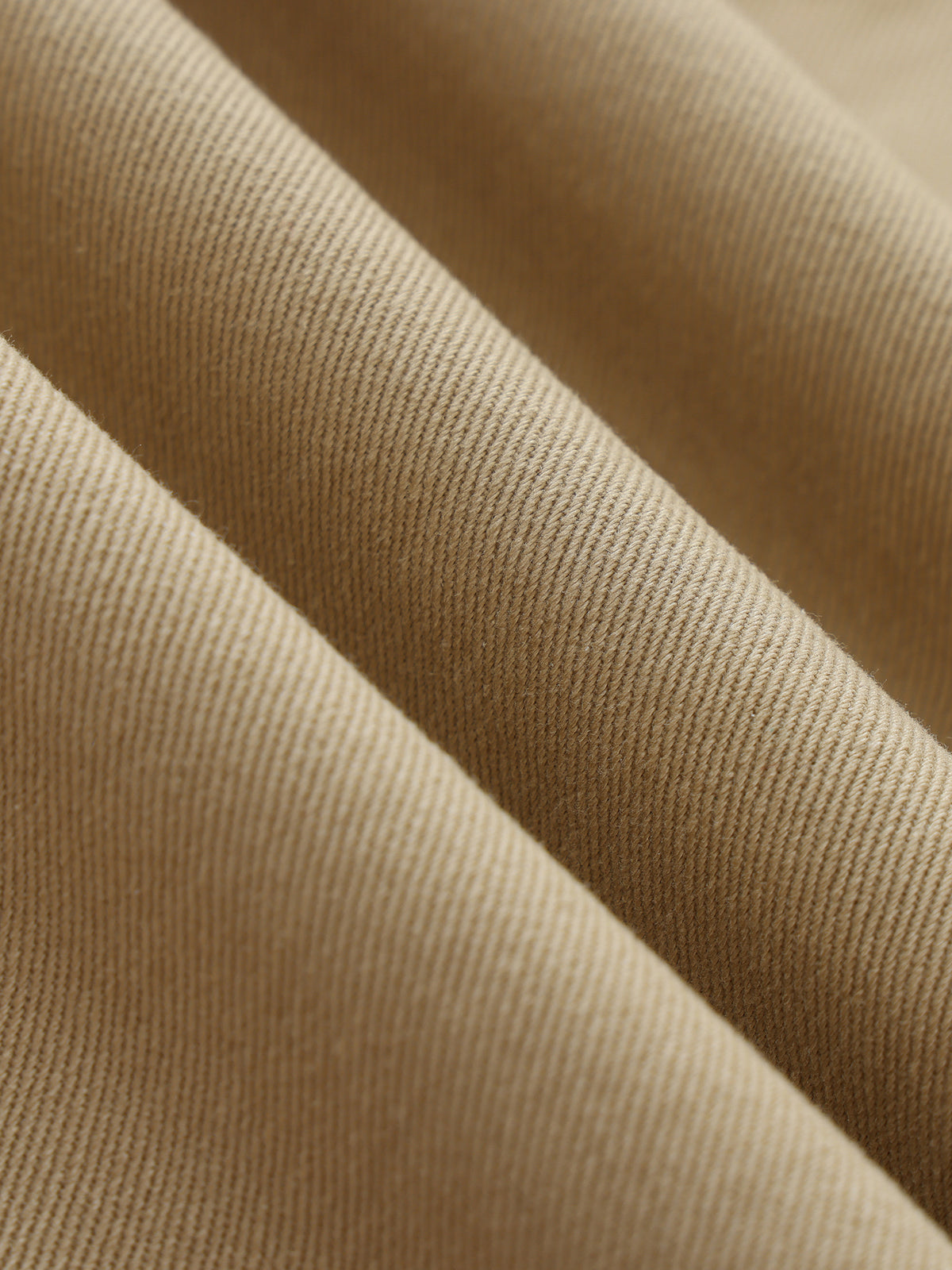 Twisted-Seam Belted Curved-Blade Pants